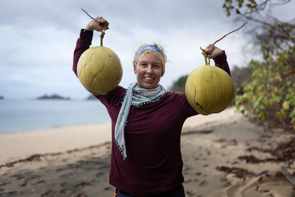 Laura Try holding coconuts