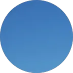 Blue circle against a pixelated background